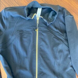 Lululemon Define Women’s Jacket
Luon Black/Gold  Size 12
